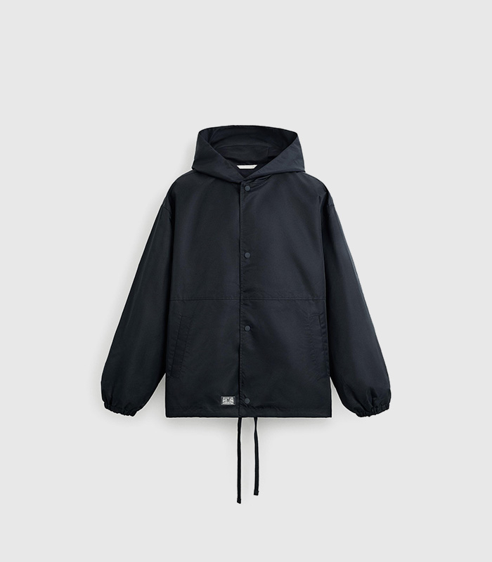 Hooded technical jacket