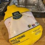 Fresh Whole Young Chicken in Food-Grade Packaging for Safe Cooking and Food Storage.